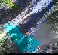 Explore Maleny Montville and take a swim under the waterfall. - Holiday Find