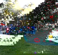 Community Christmas Party and Carols by Candlelight - Holiday Find