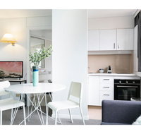 Bright modern studio steps from the action - Holiday Find