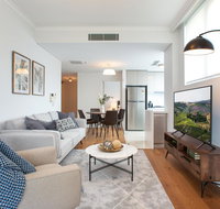 Tidy Apartment with Balcony and Parking Near Trains - Holiday Find
