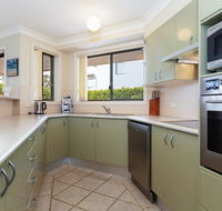 2 'Peninsula Waters' - three bedroom unit with spacious private courtyard  WIFI - Holiday Find