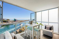 Azure Bliss Family escape opposite beach with heated pool access