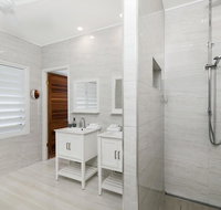 Bathers across the bay from Port Douglas - Holiday Find